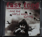 FAST FOOD AND THE WORLD KEEPS TURNING - CD -