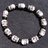 Pulsera Calaveras Medianas blanca/marrón