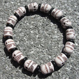 Pulsera Calaveras Medianas blanca/marrón